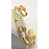 Gold Tone Cuff Bracelet with Rhinestone Embellishments & Geometric Accents - Deweytiques
